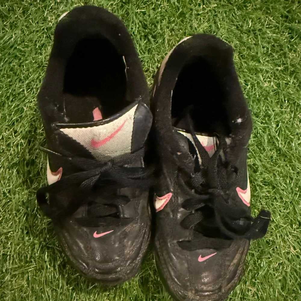 Nike Black and Pink Athletic Cleats